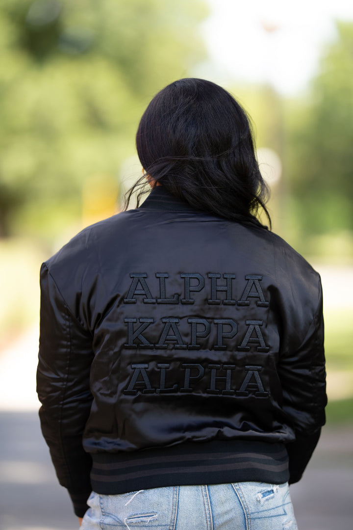 AKA All Black Bomber Jacket| Fashionably Greek