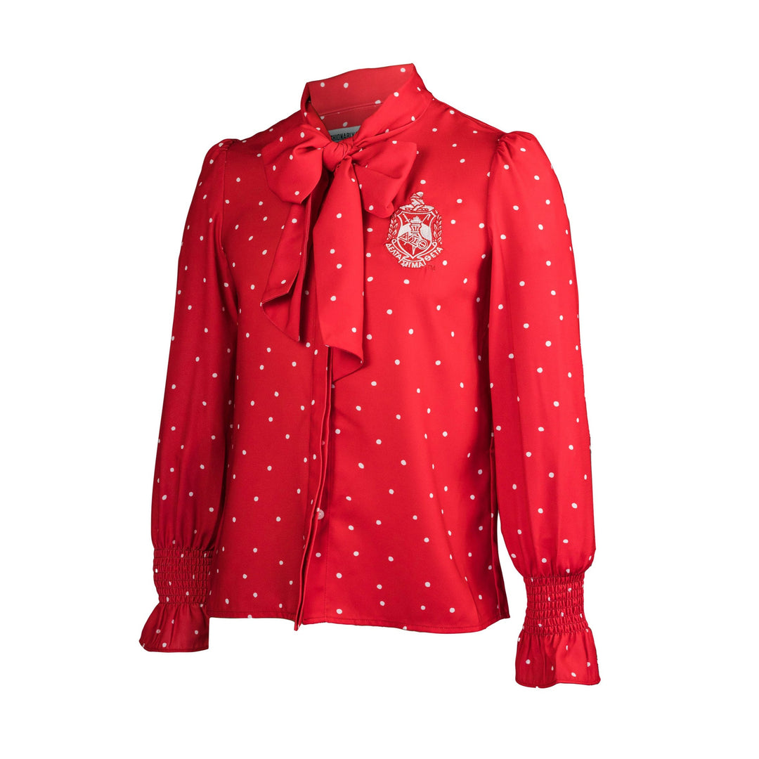 red and white polka dot blouse